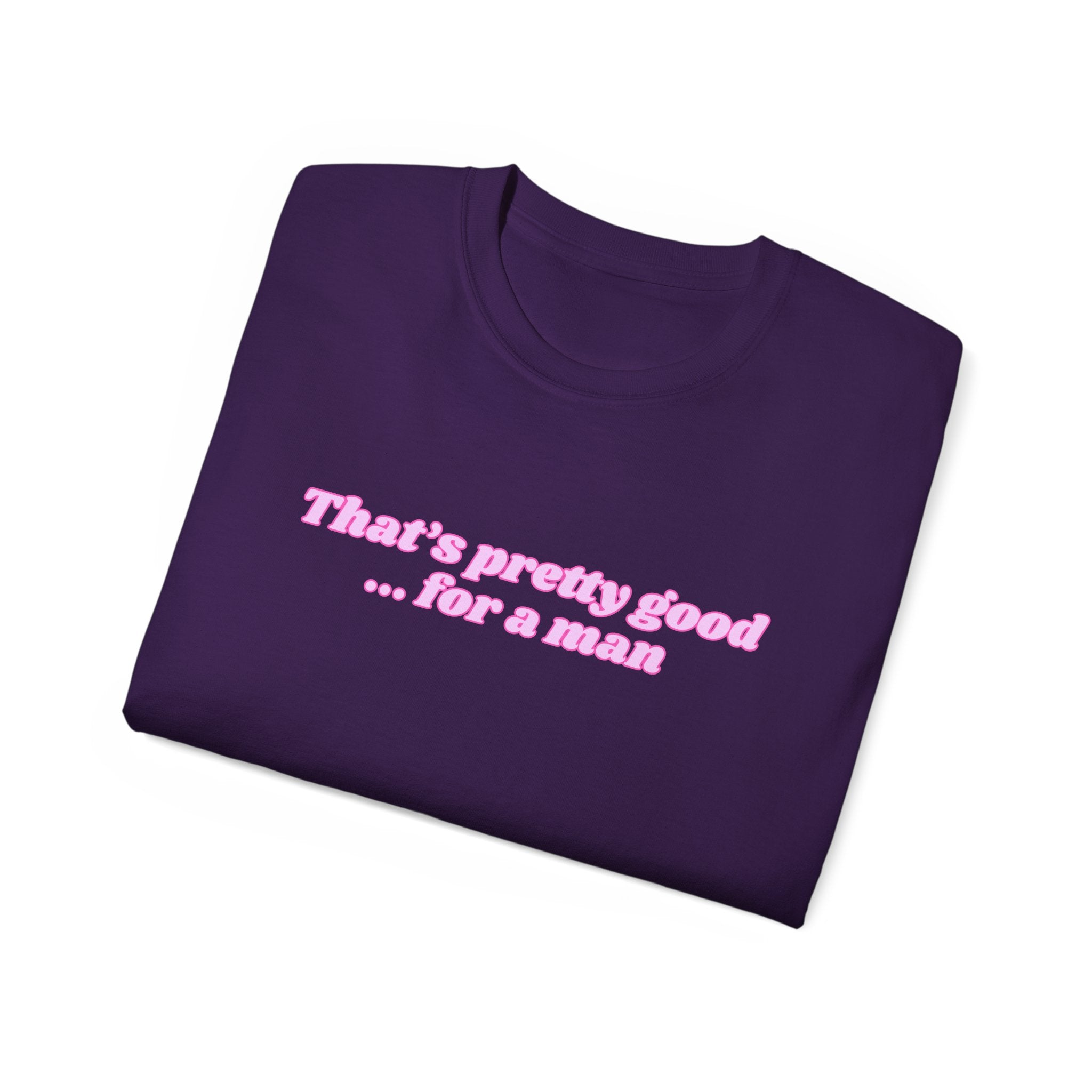 "That's Pretty Good...For a Man" Graphic Tee — Feminine Pink Retro Text T-Shirt