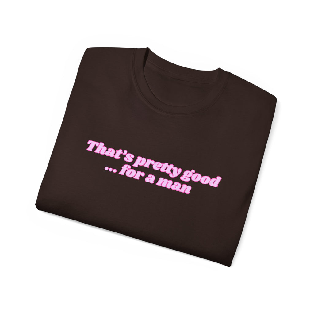 "That's Pretty Good...For a Man" Graphic Tee — Feminine Pink Retro Text T-Shirt