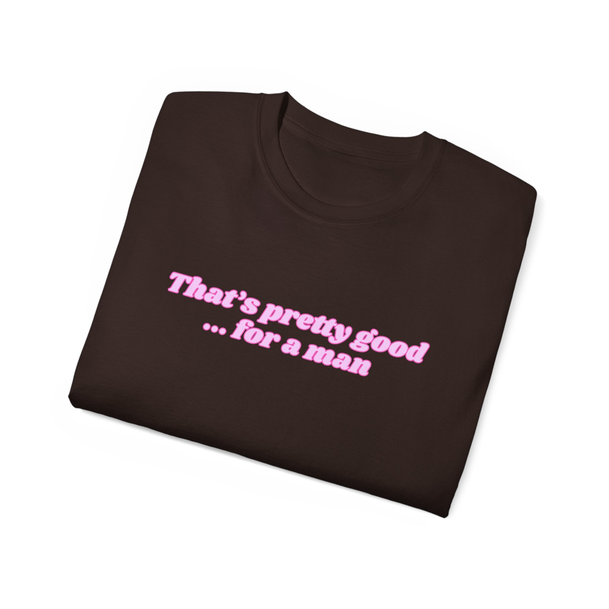 "That's Pretty Good...For a Man" Graphic Tee — Feminine Pink Retro Text T-Shirt